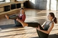 Leg lifts targets and burns the extra belly fat. (Image via Pexels/ Cliff Booth)